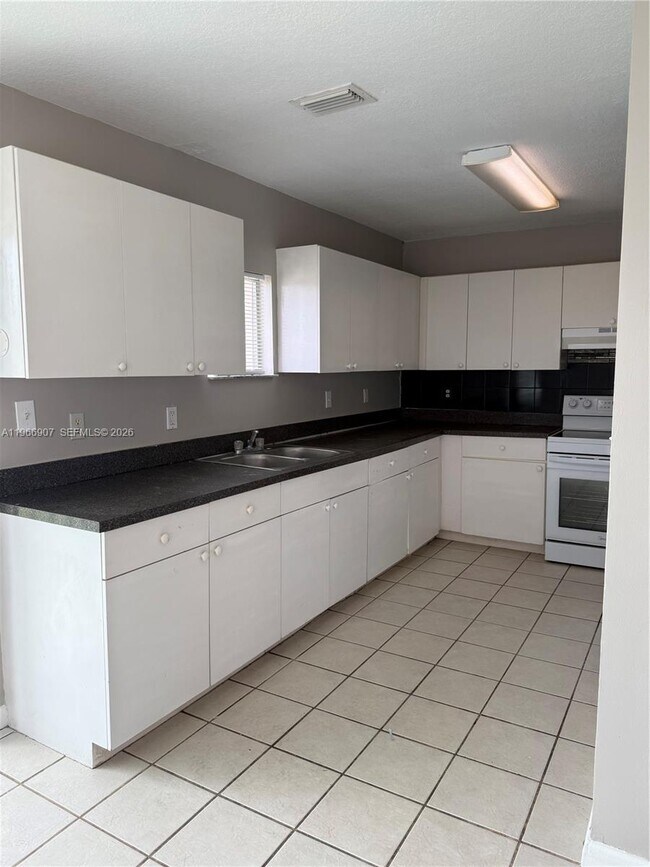 Building Photo - 1205 NW 7th Ave