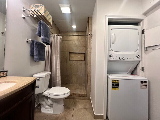 Building Photo - One bedroom semi-furnished bottom floor condo