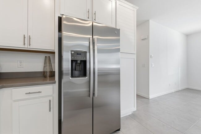 Building Photo - BRAND NEW, NEVER-LIVED-IN Lennar Corner Unit — 4 Bed / 3 Bath with Premium Upgrades!