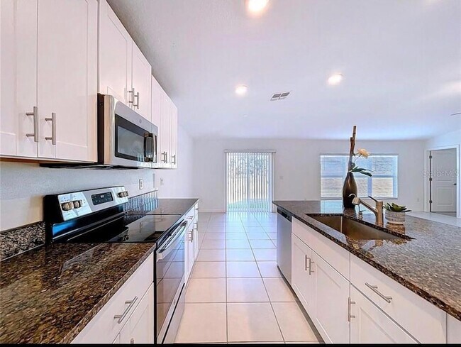 Building Photo - 6557 Bar S Bar Trl