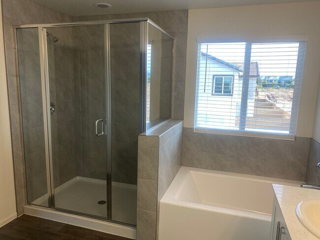 Building Photo - brand-new with two car garages, four bedro...