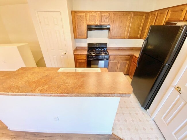 Building Photo - TOWNHOME LOCATED IN GATED BLACKHAWK COMMUN...