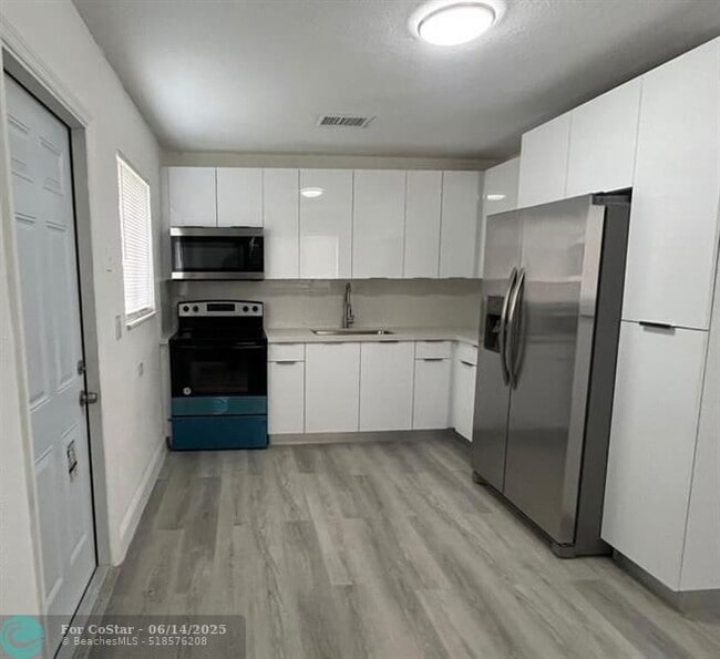 Building Photo - 1449 W 36th St