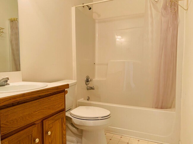 Building Photo - Great location! Lawncare/water is included...