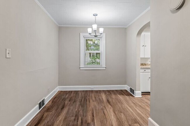 Building Photo - Adorable Home, Just Painted, Wood Flooring...