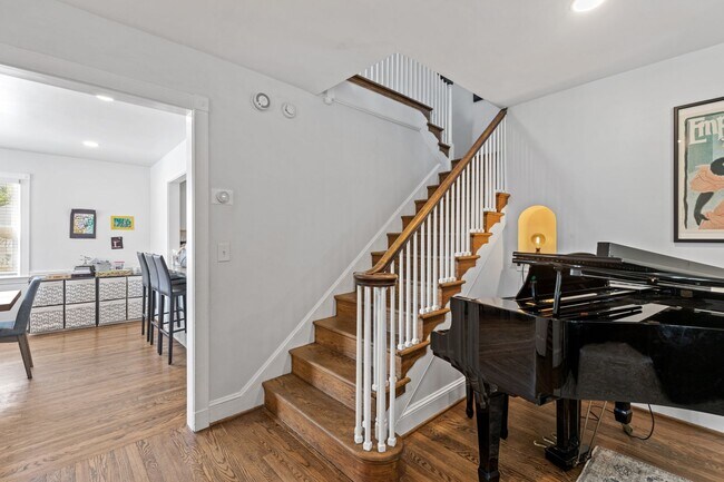 Building Photo - Luxurious Brick Colonial in Prestigious Gu...