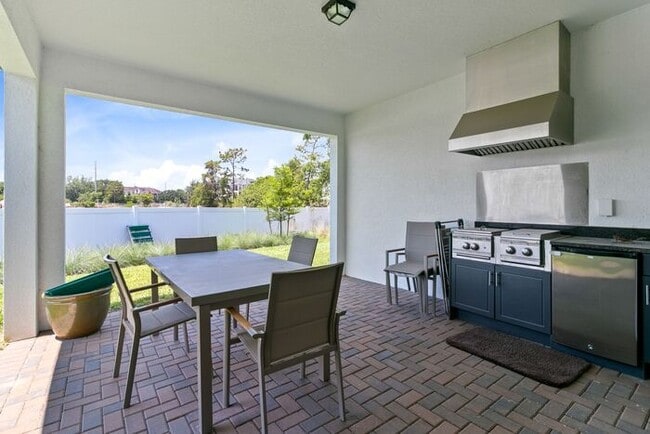 Building Photo - 4 Bedroom/3.5 Bathroom Gated Community at Ruby Lake!!!!