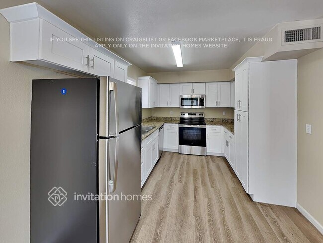 Building Photo - 9023 W Harmont Dr