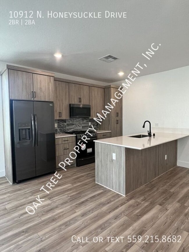 Building Photo - 10912 N Honeysuckle Dr