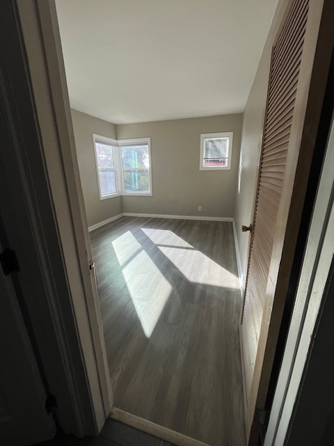 bedroom, gray wood vinyl flooring - 625 W Maple St