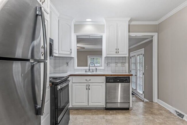 Building Photo - McLeansville - Minutes from Elon & Greensboro! Brick Duplex on a few Acres, Den, SS Appliances, F...