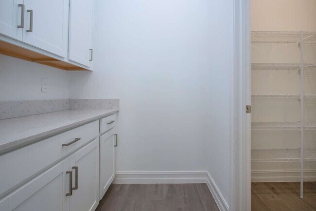 Building Photo - Spacious Like New 4-Bedroom Oasis with 3 F...