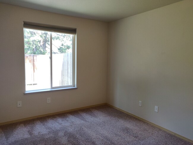Building Photo - Charming 4-Bedroom Home on 1/2 Acre with a...