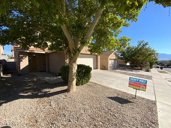 Building Photo - 3 Bedroom Home Available Near Unser Blvd N...