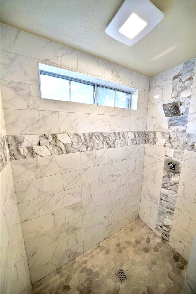 Building Photo - Executive Home in Greenshire with Luxurious Updates and Spacious Outdoor Living - Agent Commissio...