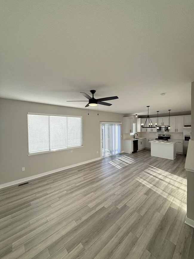 Building Photo - Spacious 4-Bedroom Home with 2-Car Garage & Yard