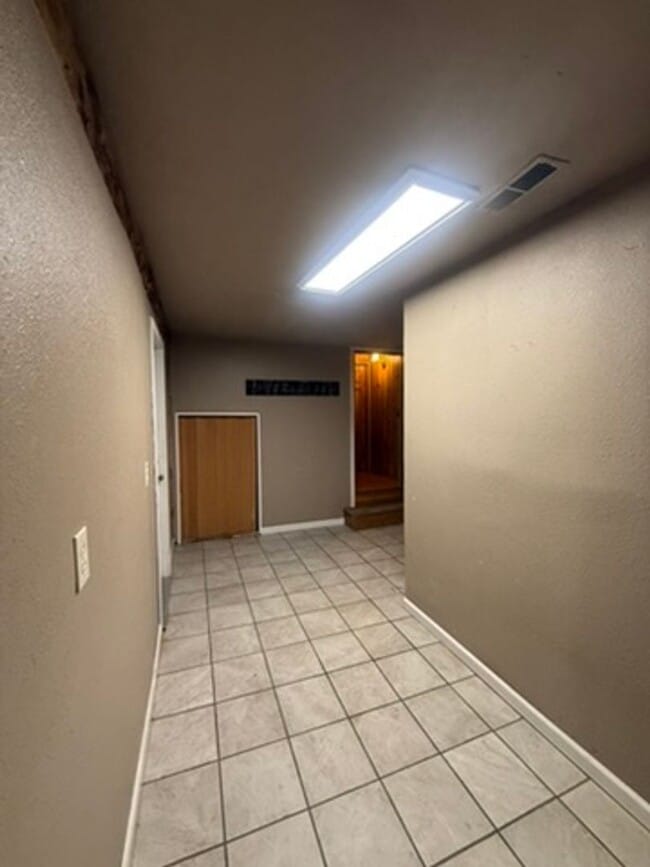 Building Photo - Spacious Pet-Friendly Home with Fireplace, Garage & Huge Deck Near Fairbanks