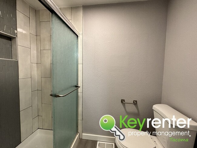 Building Photo - Shared Split level 3 Bed 2 Bath Upstairs Unit with Modern Upgrades Close to JBLM!