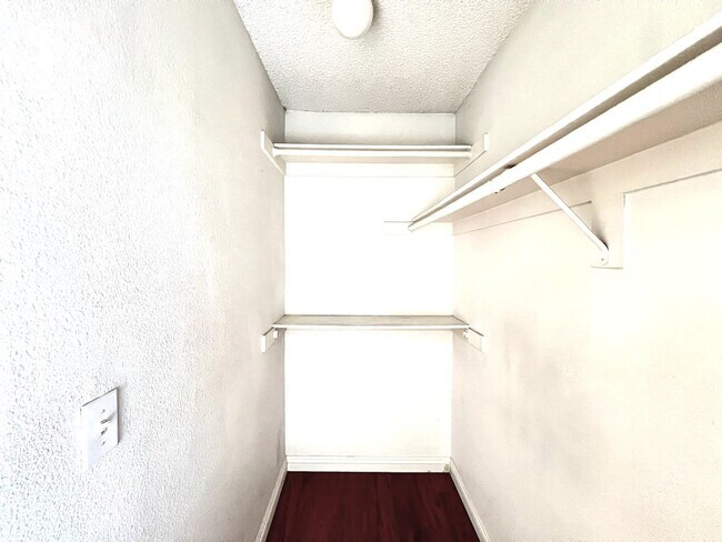 Building Photo - 2 Bedroom, 2 Bath Upstairs Condo with Private Balcony & 2-Car Garage, Gated Community, Water/Tras...