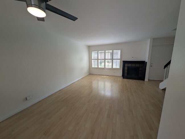 Building Photo - MOVE-IN READY - SPACIOUS 2-BEDROOM TOWNHOM...