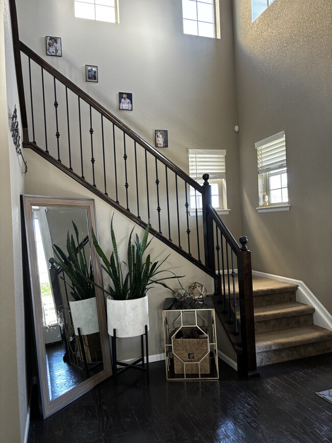 Entry way with great vaulted ceiling and chandelier - 21876 E Stroll Ave