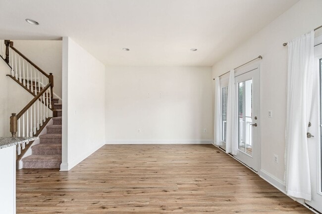 Building Photo - Your Next Home: Modern 3-Level Townhome with Garage, Deck & Huge Flex Space