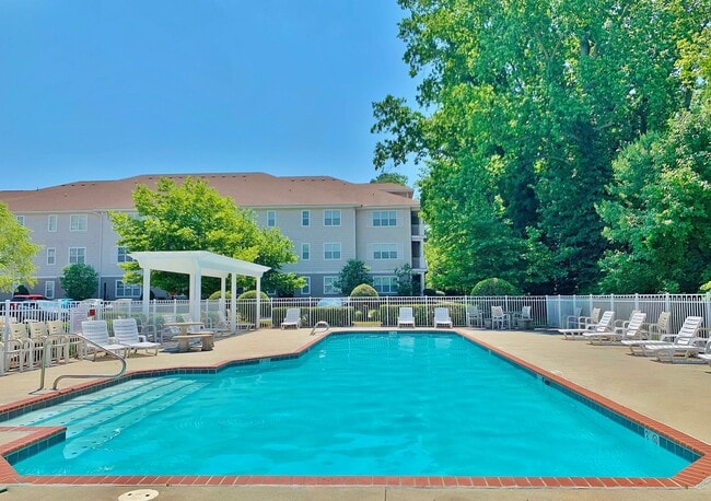 Building Photo - 2 Bedroom Condo w/Open Floor-Plan & Stainless Steel Appliances! Some Utilities Included!