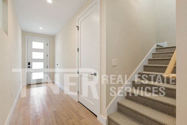 Building Photo - Elegant Modern Living