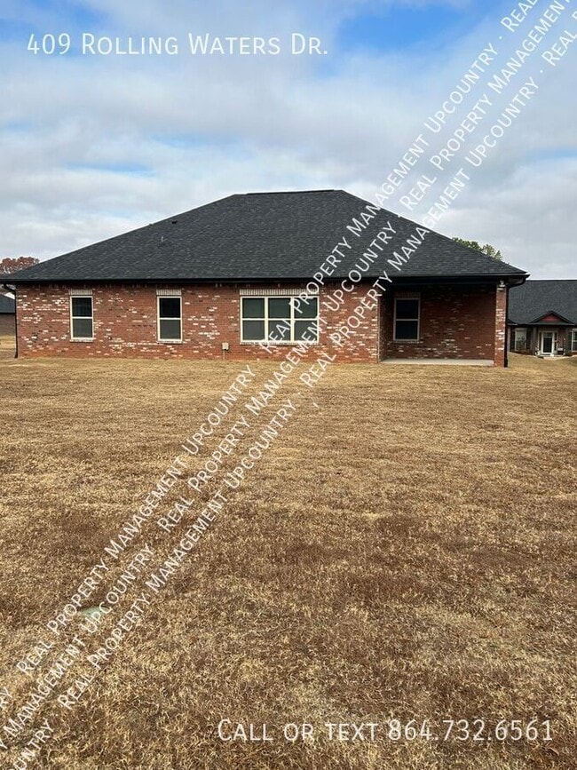 Building Photo - 409 Rolling Waters Dr