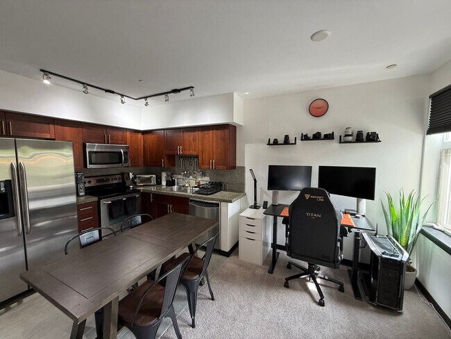 Building Photo - Modern 1BR Condo with Luxury Amenities in ...