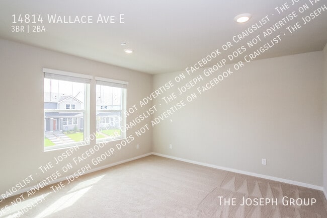 Building Photo - 14814 Wallace Ave E
