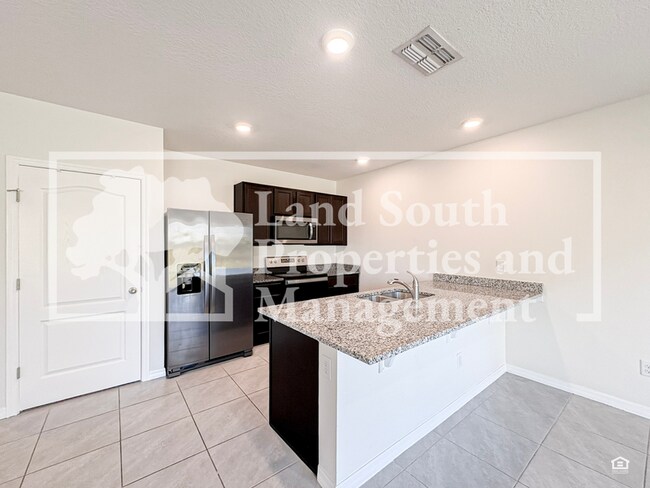 Building Photo - 5781 Arlington River Dr.