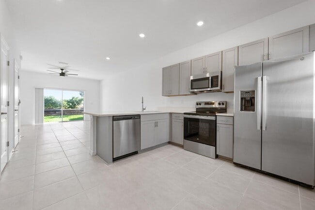 Building Photo - BEAUTIFUL 2 BEDROOM 2.5 BATHROOM TOWNHOME LOCATED IN THE HIGHLY SOUGHT AFTER SKY RANCH COMMUNITY!