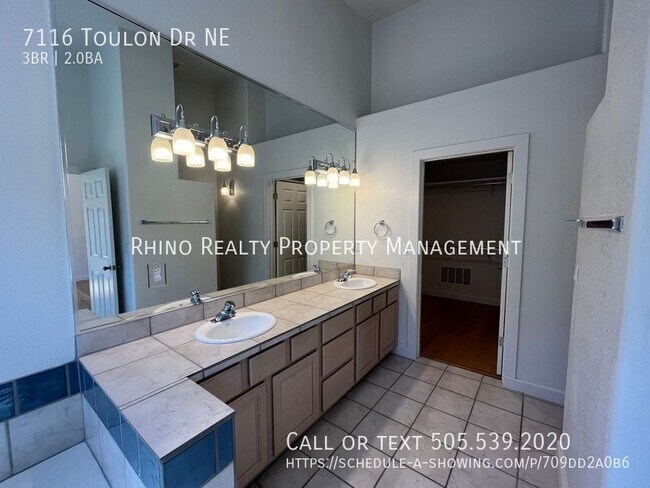 Building Photo - 7116 Toulon Dr NE