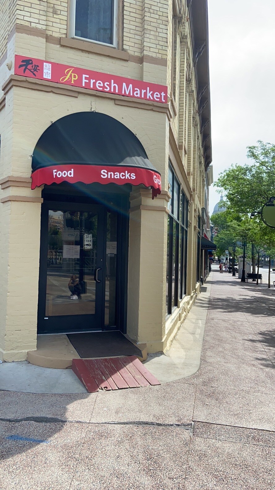 Grocery store downstairs - 207 W Gorham St