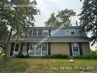 Building Photo - 1802 Manhattan Dr