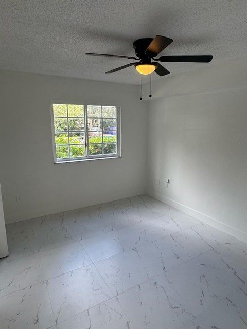 Building Photo - 3221 Sabal Palm Manor