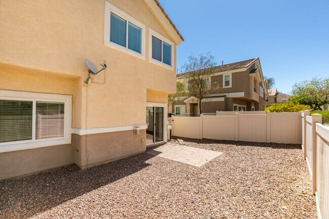 Building Photo - Great townhome in Henderson Gated Community with a 2 car attached garage and backyard