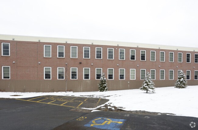 Building Photo - Huse School Apartments