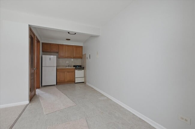 Building Photo - 6250 W 64th Pl