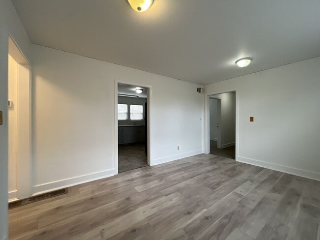 Building Photo - Expansive 4BR 2,900+ Sq Ft Home with Theater-Style Living Room & Bonus Hobby Workshop