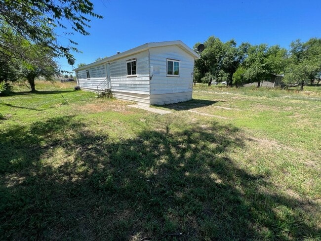 Building Photo - Semi-Rural 2 Bedroom 1 Bath Updated Mobile Home w/ Amenities