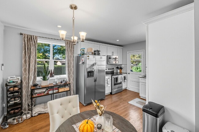 Building Photo - Convenient, Affordable and Updated!!.... Fenced 1/4 acre Yard, 3BR and walk-out basement.... Pets...