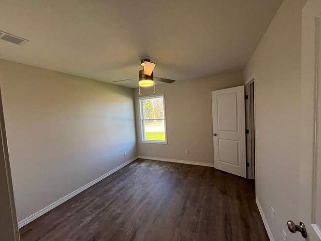 Building Photo - BRAND-NEW 3-bedroom, 2-bath home with Spri...