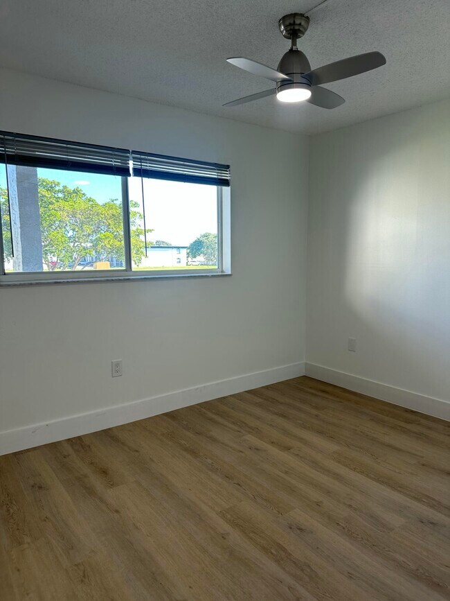 Building Photo - 8130 Sunrise Lakes Blvd