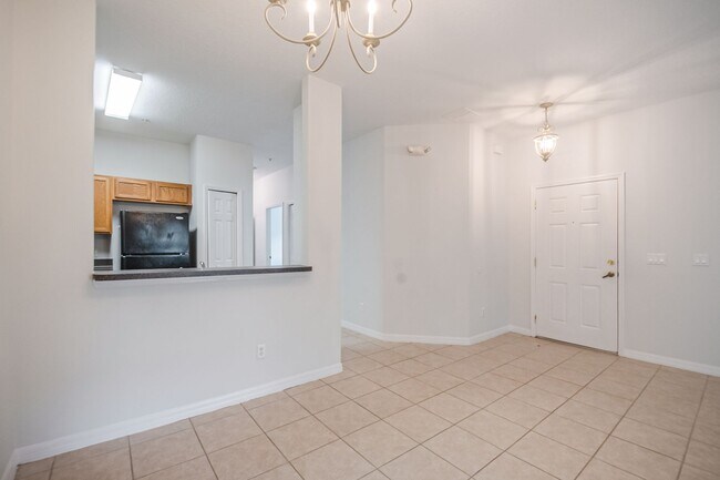 Building Photo - Spacious 3/2 Condo in the Gated Oakwater Community with Single Car Garage! Brand new carpets and ...