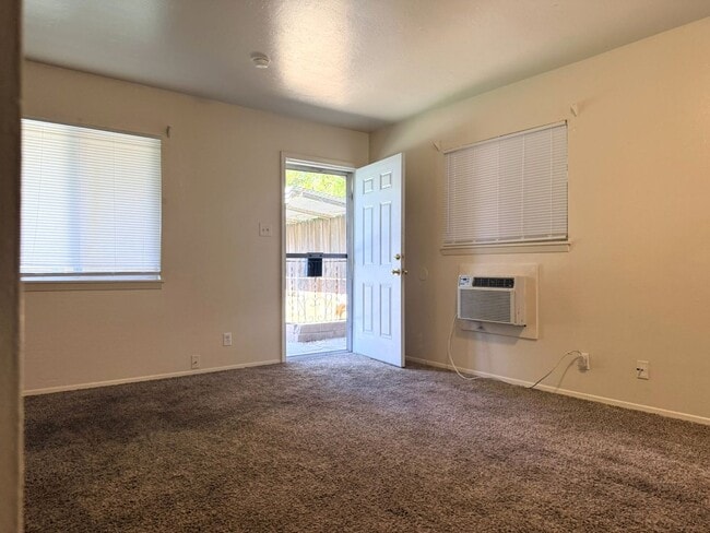 Building Photo - Cozy Studio With Designated Carport!