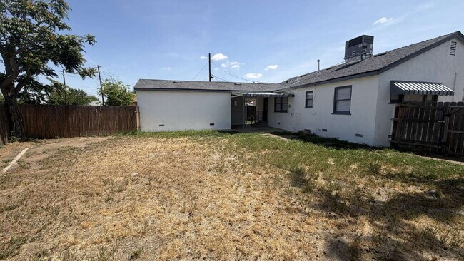 Building Photo - Charming Updated Home with Spacious Yard