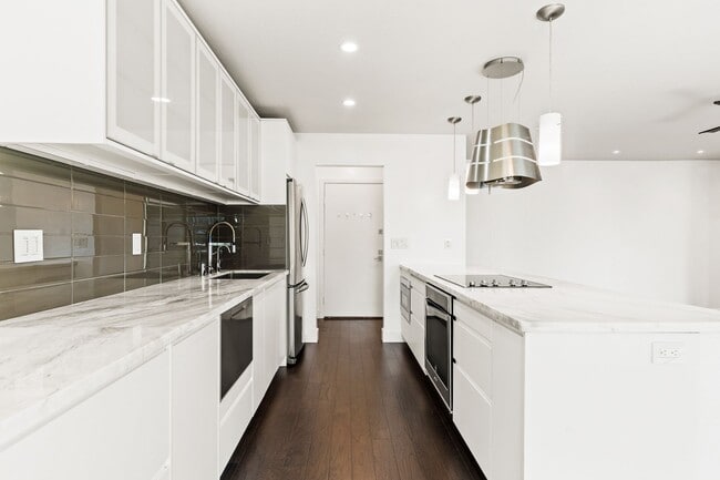 Building Photo - Modern Sanctuary with High-End Upgrades