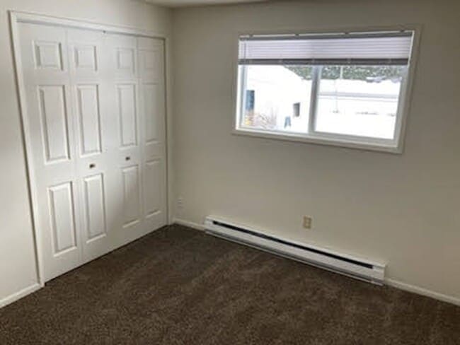 Building Photo - 12704-12706 E 31st Ave